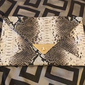 Large snakeskin print clutch
